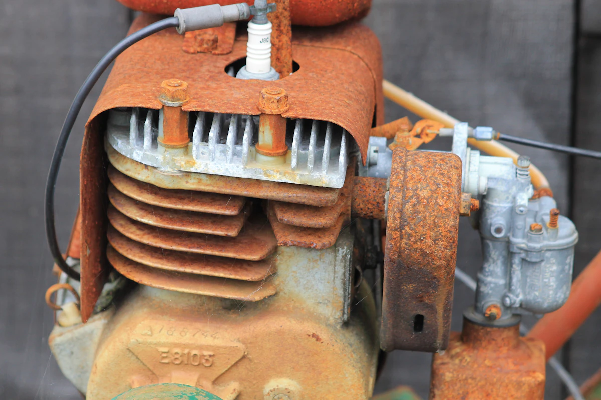 A gleaming silver and red wind-up toy robot with blinking lights and a pop-open chest compartment